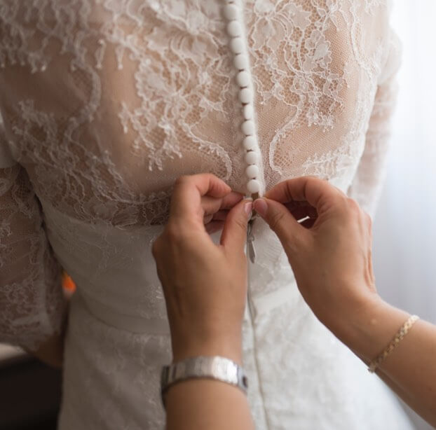 Plus size model wearing a white wedding dress