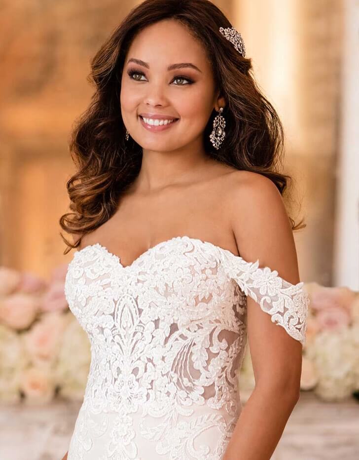 Model wearing a white wedding dress