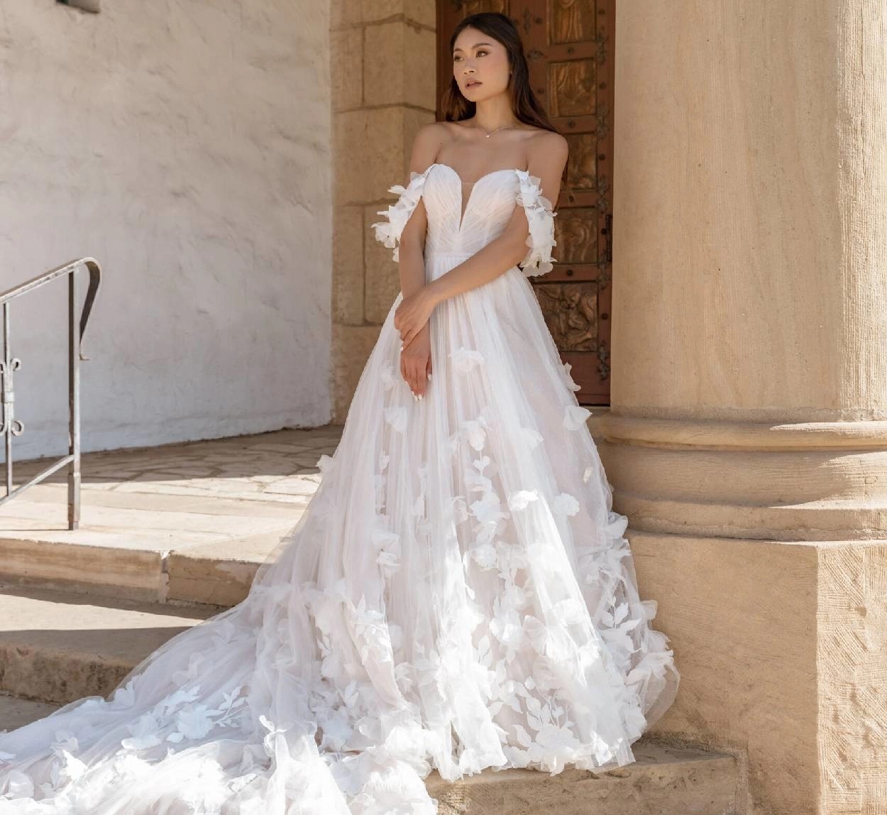 Model wearing a white wedding dress