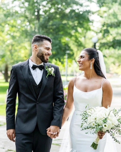 Plus size model wearing a white wedding dress