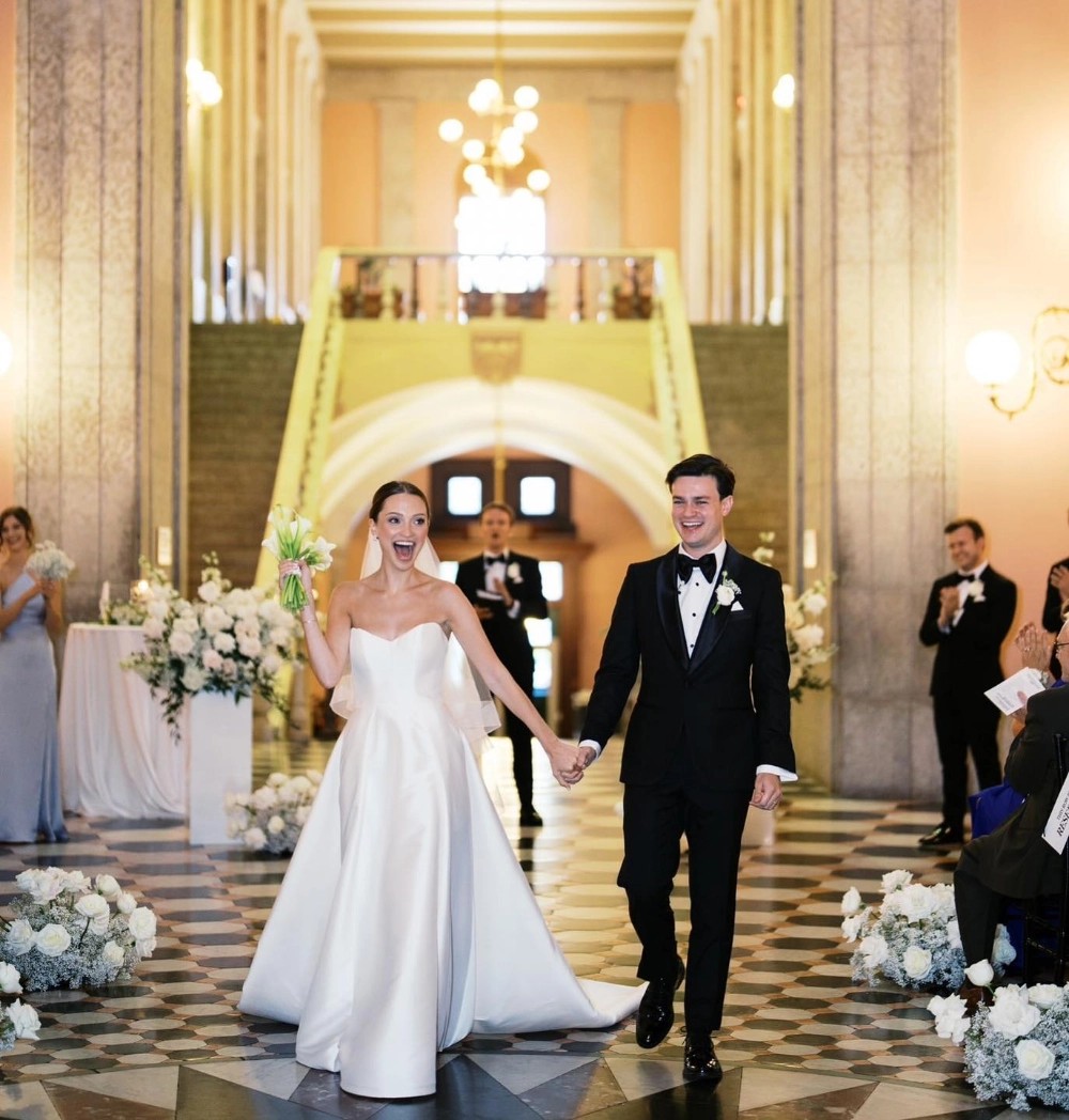 Model wearing a white wedding dress