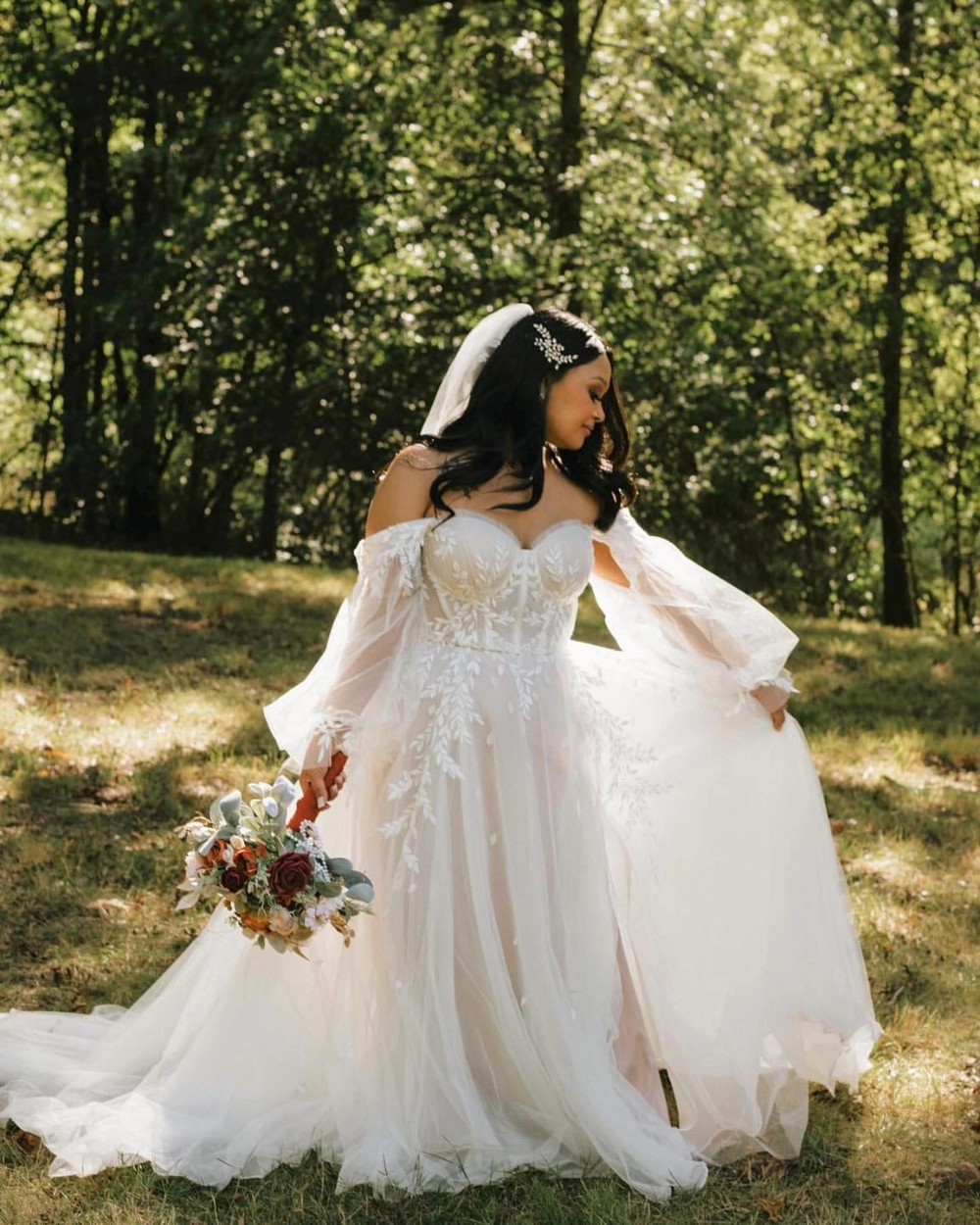 Plus size model wearing a white wedding dress