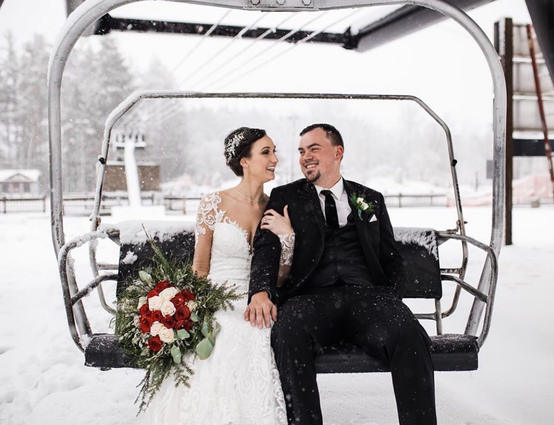 Photo of a bride and groom sitting
