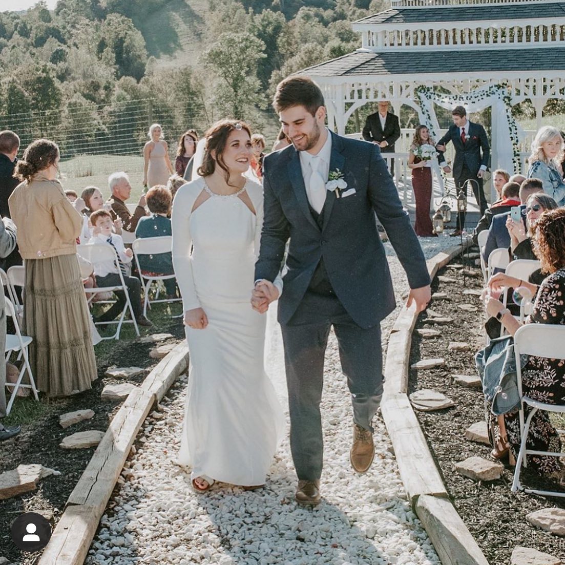 Photo of a real bride and groom walking